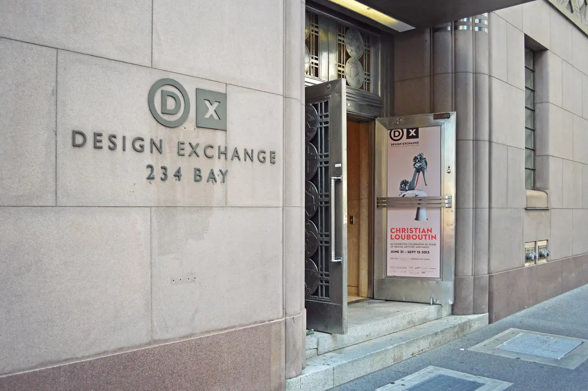 The entrance of the Design Exchange at 234 Bay Street, Toronto, with a poster for a 2013 Christian Louboutin exhibition
