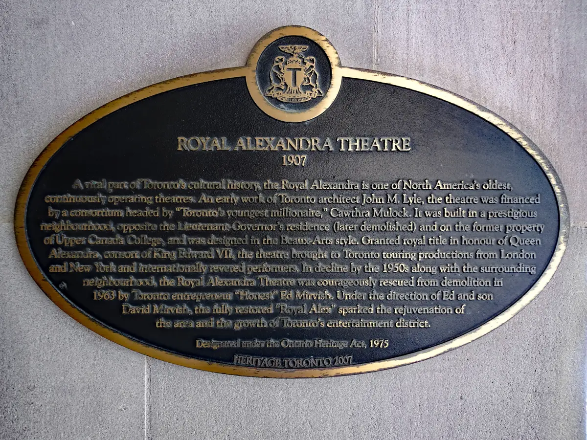 A Heritage Toronto plaque reading Royal Alexandra Theatre, 1907, mounted on a pale stone wall