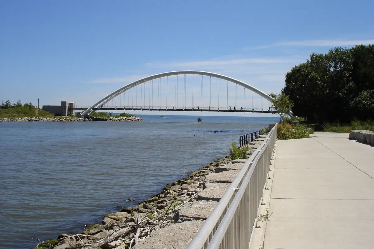 The mouth of the Humber River looking south toward Lake Ontario, with the pedestrian bridge crossing it