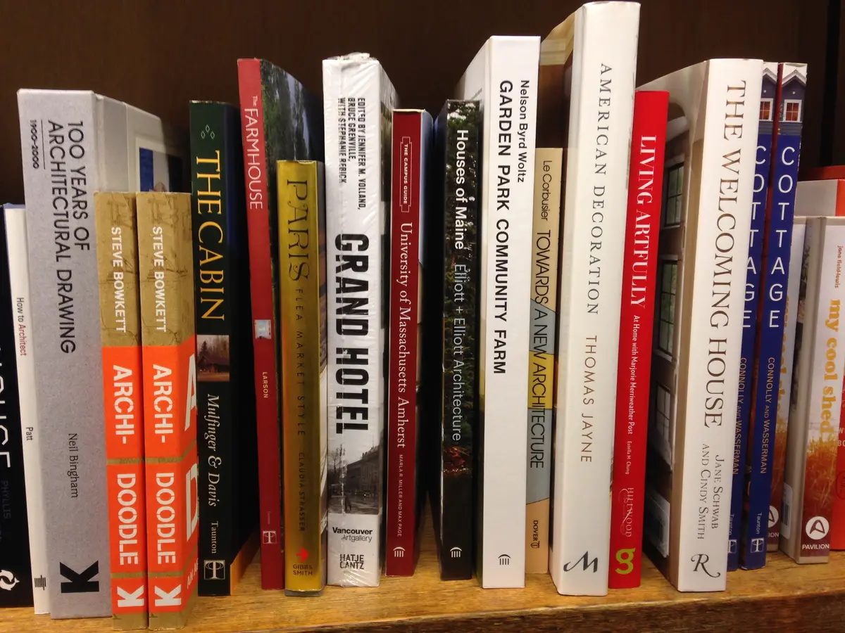 A shelf of books with their spines facing out