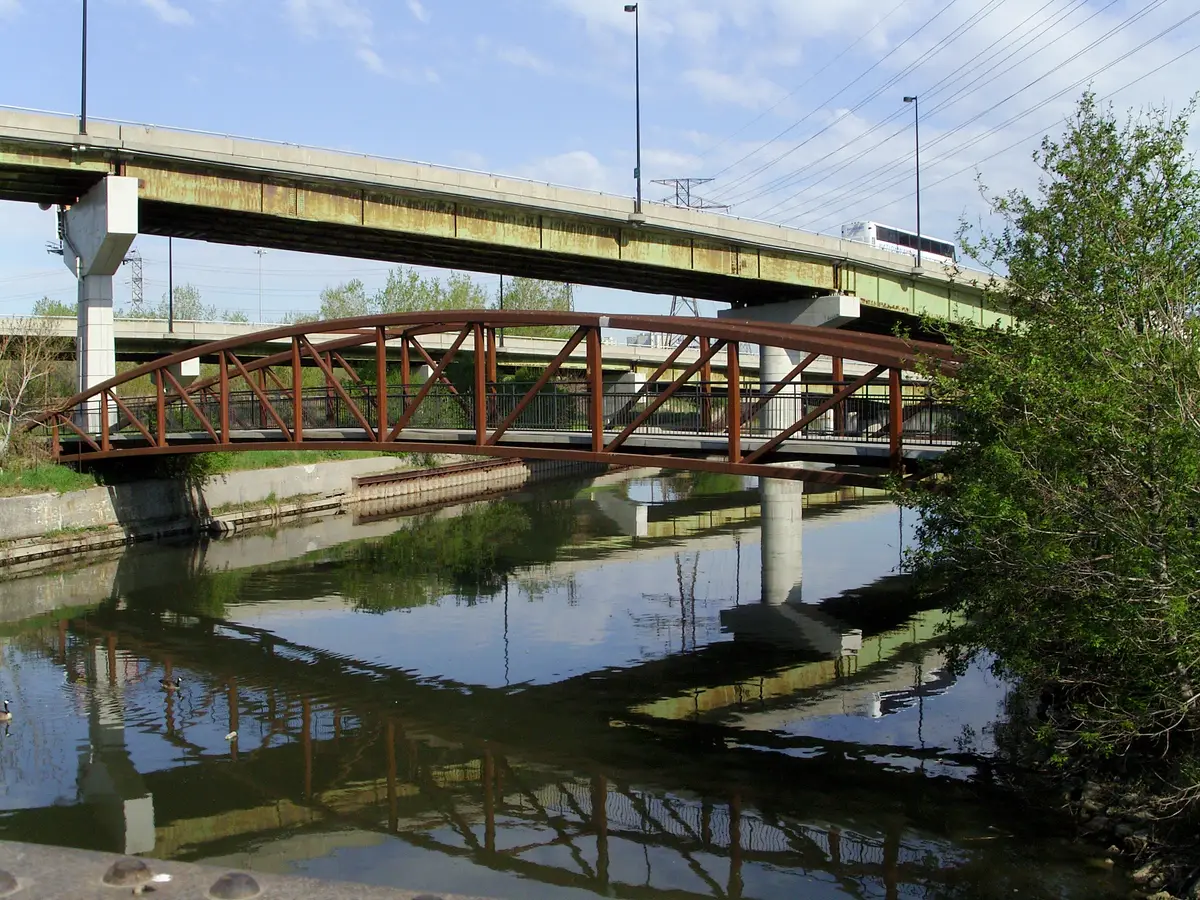 A pedestrian and cycling trail bridge crossing the Lower Don River in Toronto
