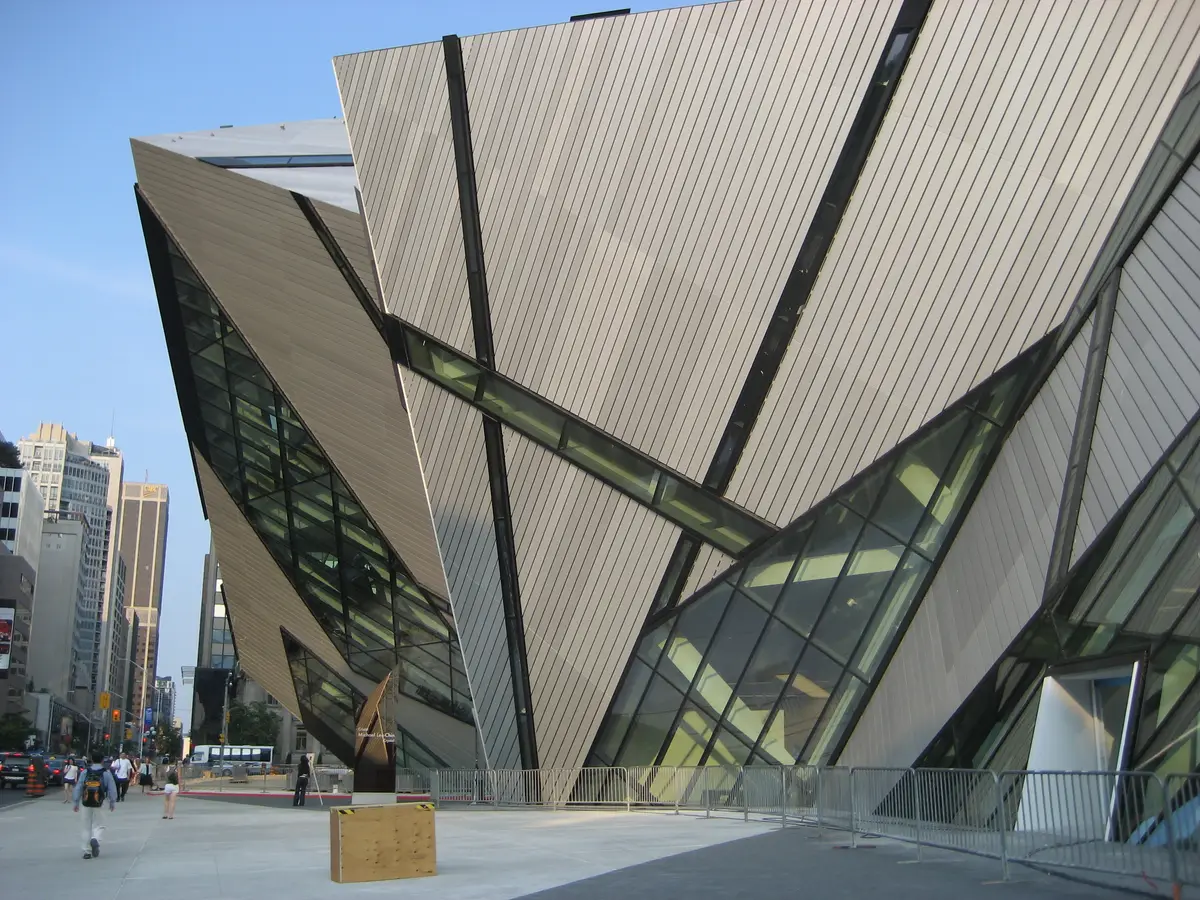 The faceted glass and metal Crystal addition of the Royal Ontario Museum on a street corner