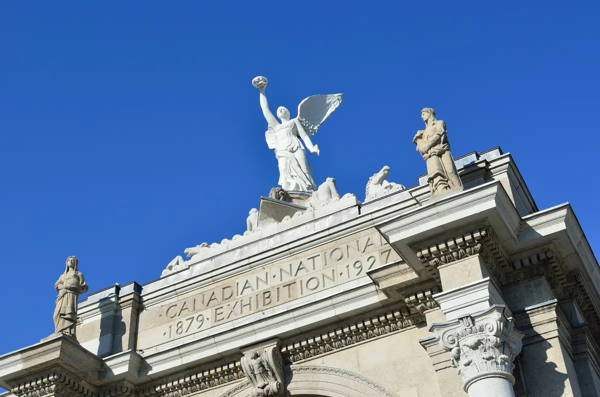 The Princes' Gates arch at Exhibition Place topped by a winged figure and carved with the Canadian National Exhibition name
