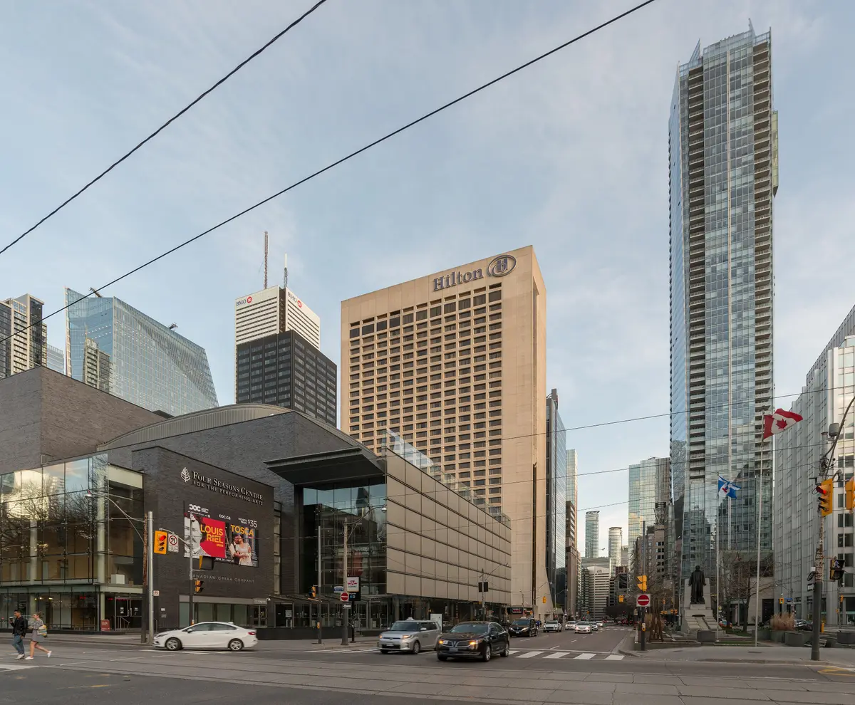 The Four Seasons Centre at the corner of University Avenue with a hotel and glass towers behind it