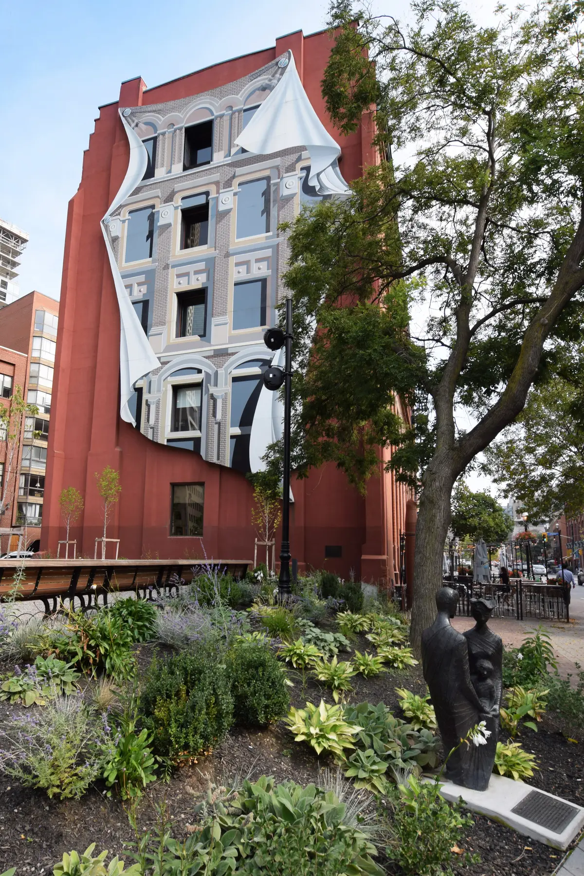 A large mural painted on the Gooderham Building in downtown Toronto
