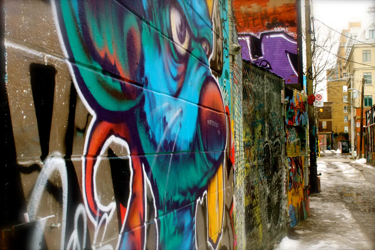 Colourful graffiti art covering the walls of Graffiti Alley in Toronto