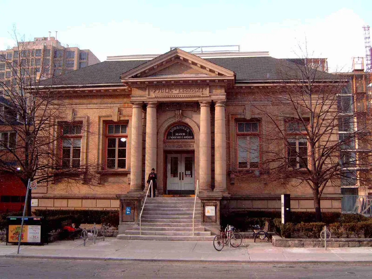 Front of the Yorkville branch, with a row of columns under a pediment and the words Public Library above the doorway
